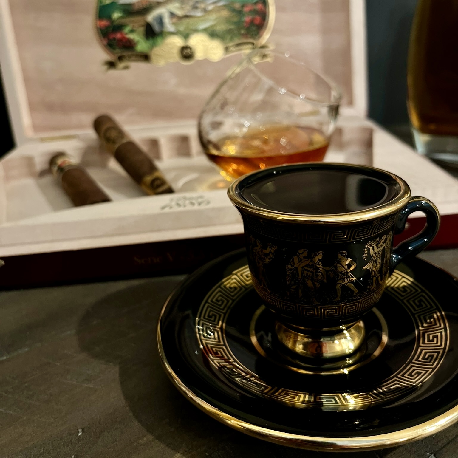 Elegant black and gold Greek coffee cup